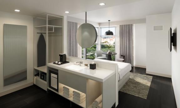 A "metro-king" room at AC Hotel St. Augustine shows a corner window