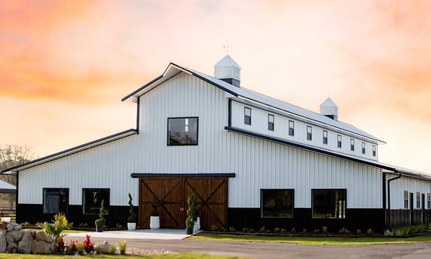 The Grand Cypress Barn at Ancient City Farmstead during sunset