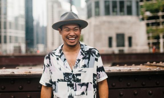 Andrew Sapin, musician, standing on a roof in Jacksonville