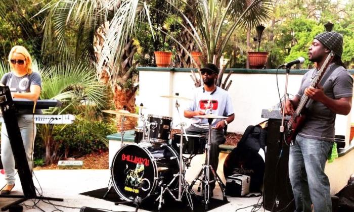 The band Chillakaya playing outside