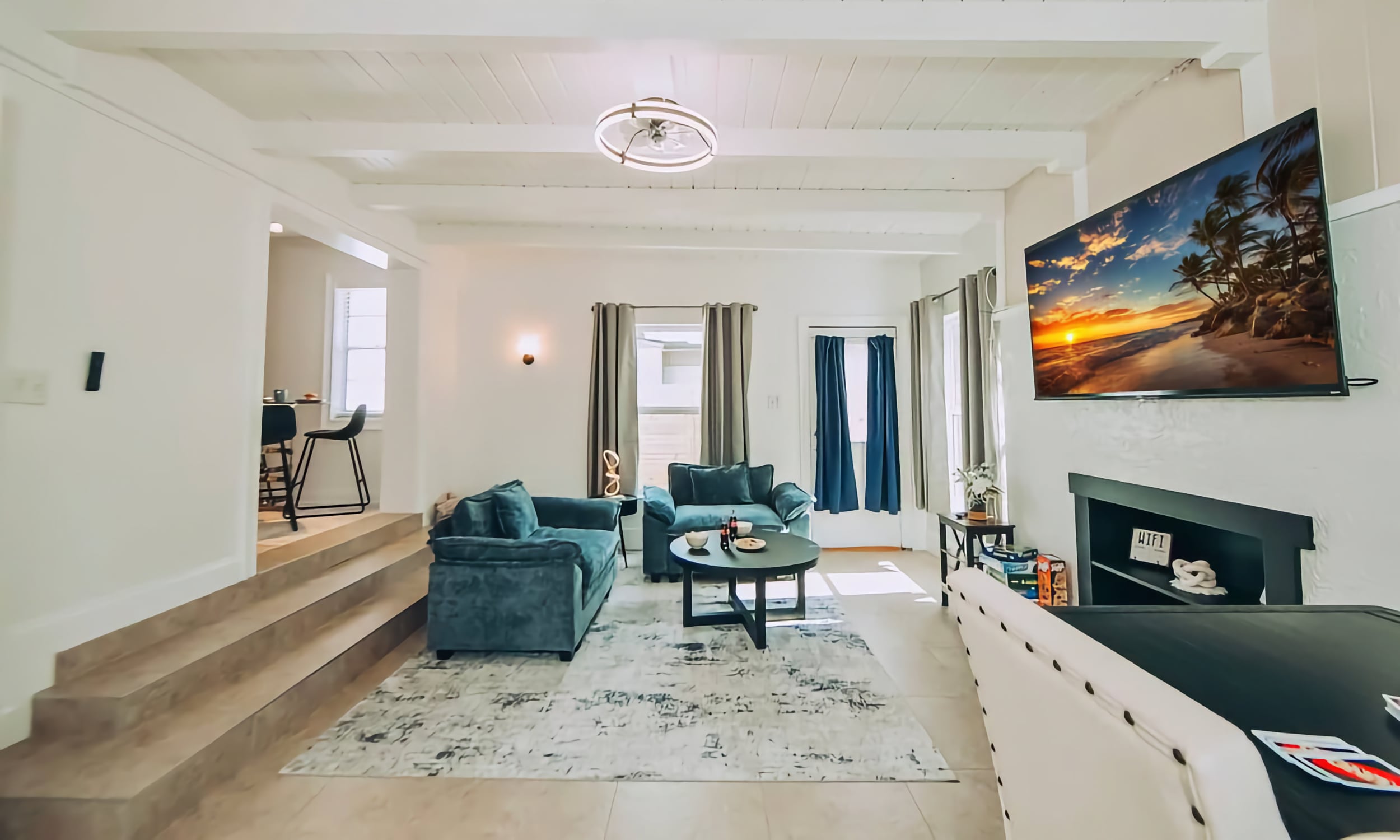 This sunken den has room for conversation, table games and a Murphy Bed