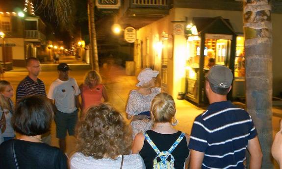 Ghost Tours of St. Augustine guides lead guests through the spooky nighttime streets.