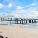 The St. Johns County Pier on St. Augustine Beach on a beautiful day.